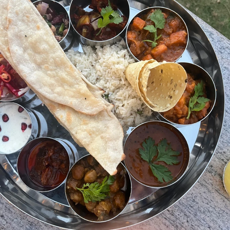 indian tali on metal dish 