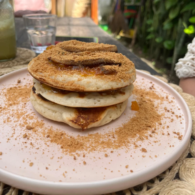 vegan pancake tower with passionfruit filling