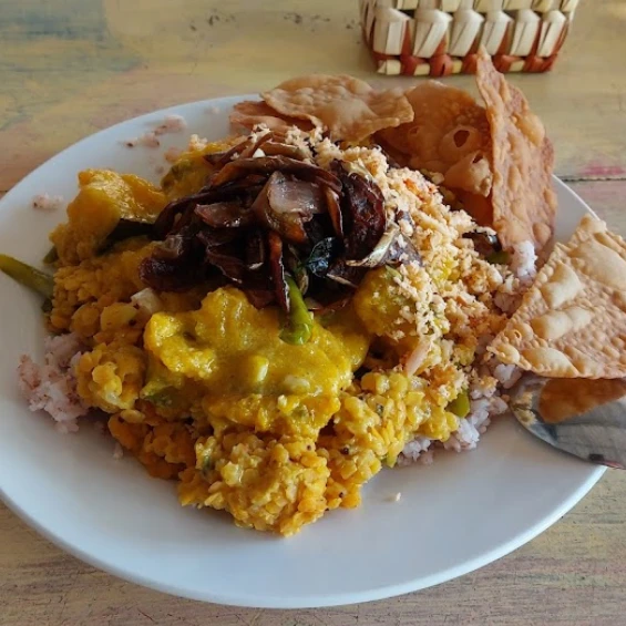 sri lankan rice and curry with dhal and papadam