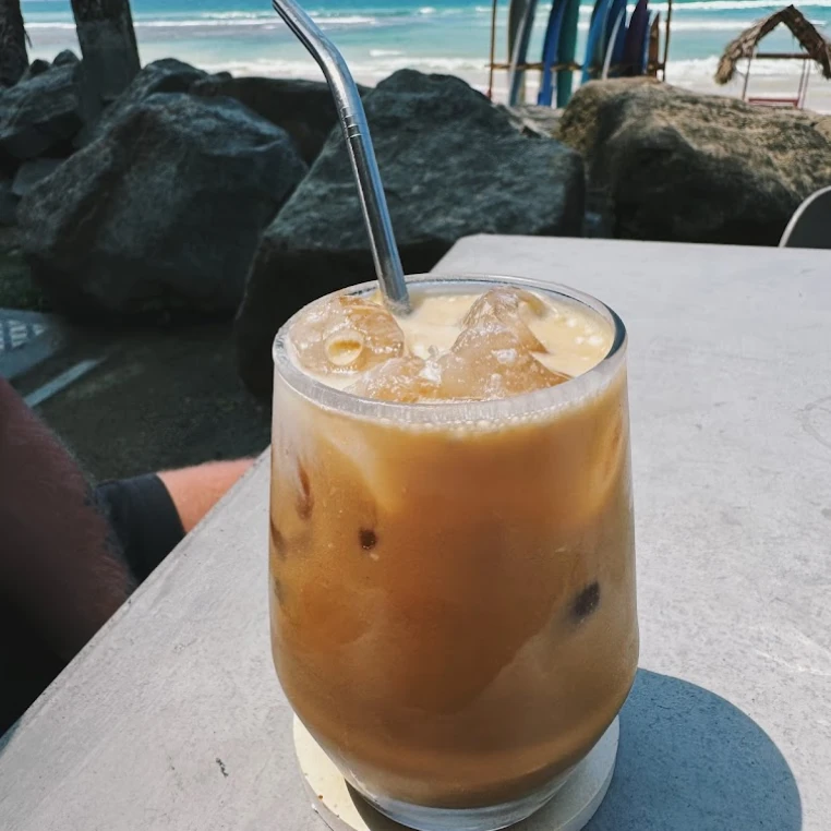 coffee at the beach with surfboards