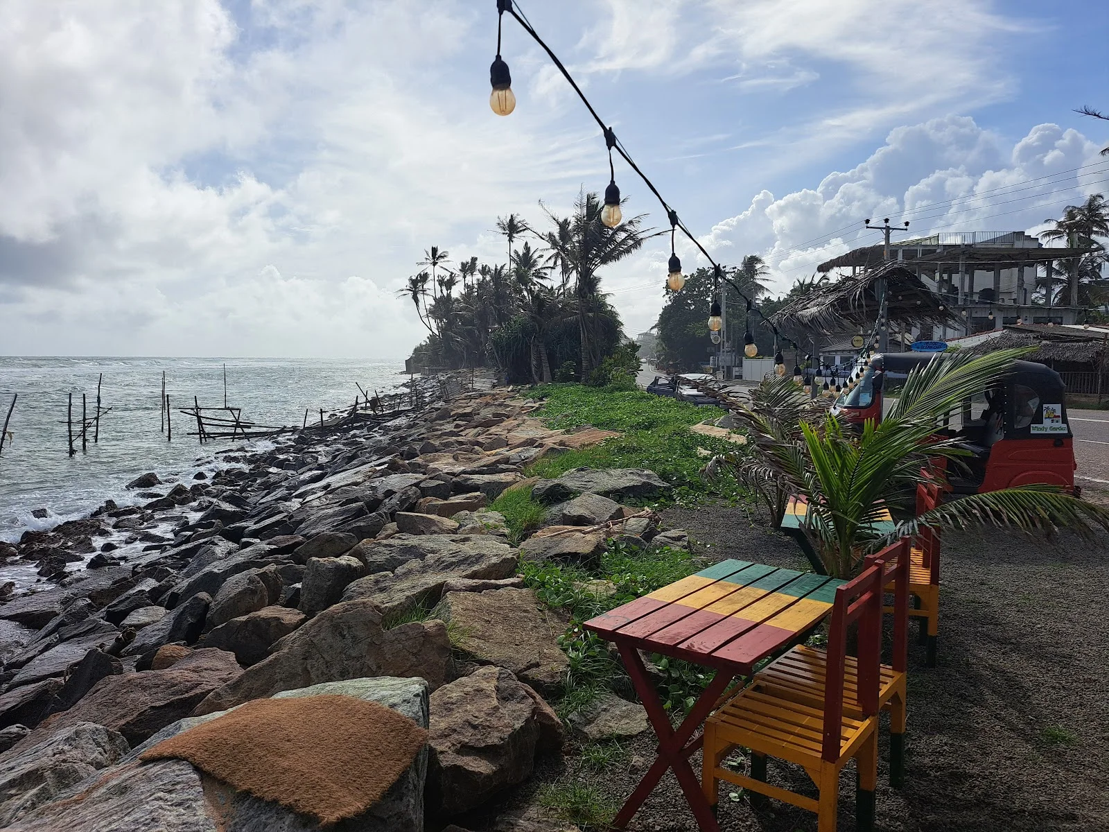 Oceanfront tables overlooking the stilt fishing poles, photo 4 of 6